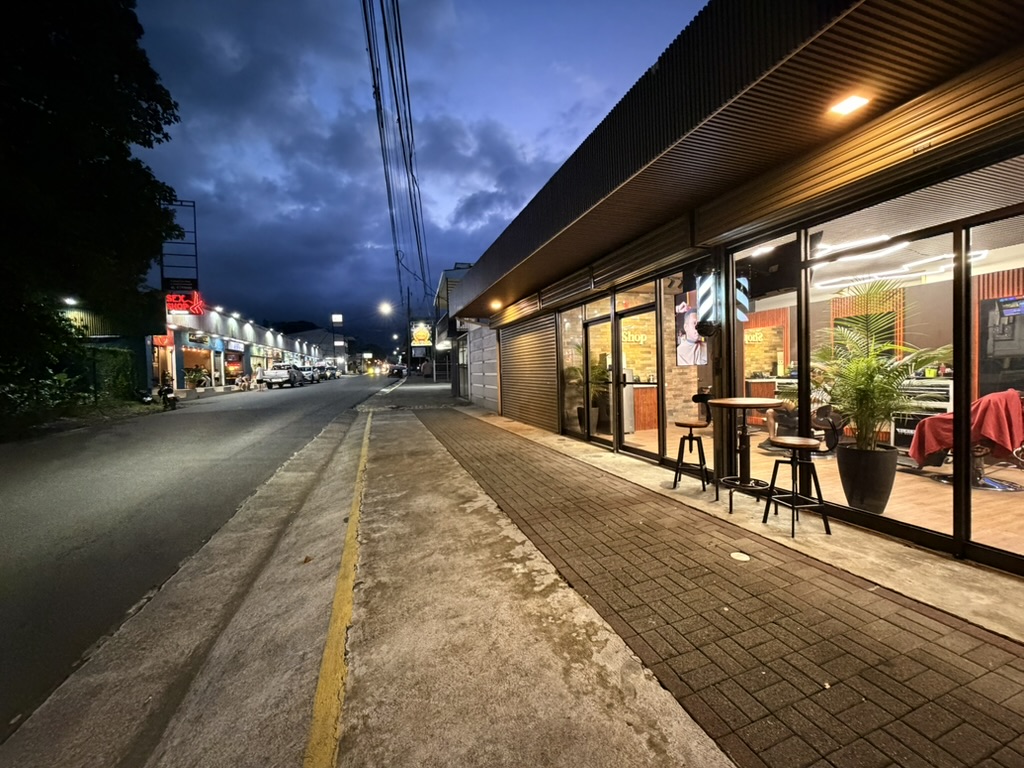The Shop's new street-facing studio at dusk